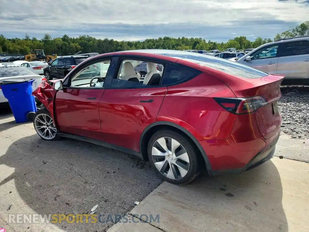 2 fotografías del automóvil dañado 7SAYGAEE3RF990362 TESLA MODEL Y 2024