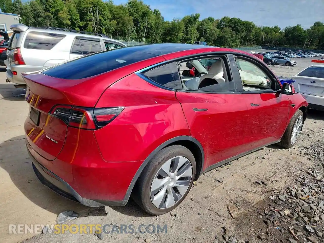 3 fotografías del automóvil dañado 7SAYGAEE3RF990362 TESLA MODEL Y 2024
