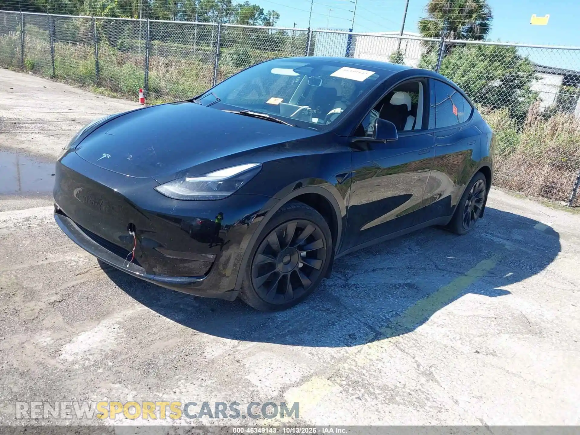 2 fotografías del automóvil dañado 7SAYGAEE5RF990878 TESLA MODEL Y 2024