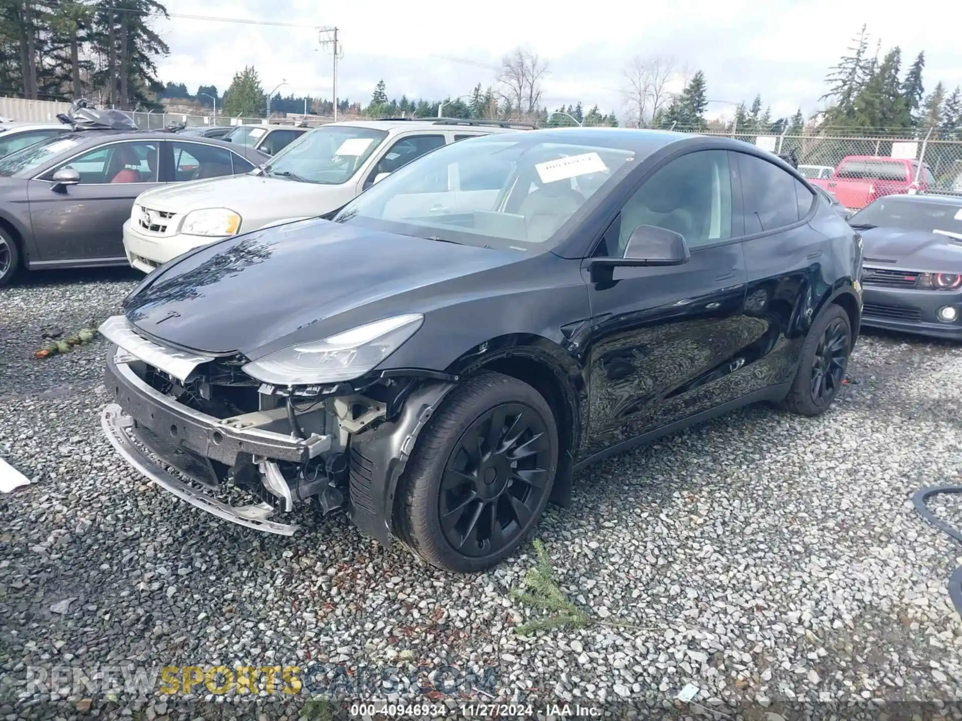 2 Photograph of a damaged car 7SAYGAEE7RF118962 TESLA MODEL Y 2024