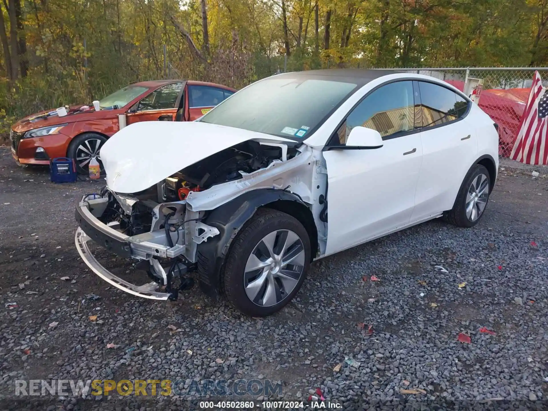 2 fotografías del automóvil dañado 7SAYGAEE8RF092274 TESLA MODEL Y 2024
