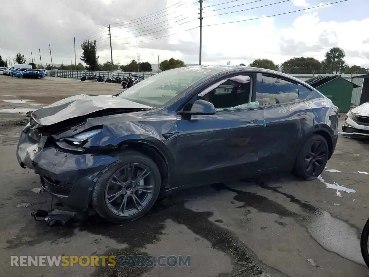 1 Photograph of a damaged car 7SAYGDED0RA329636 TESLA MODEL Y 2024