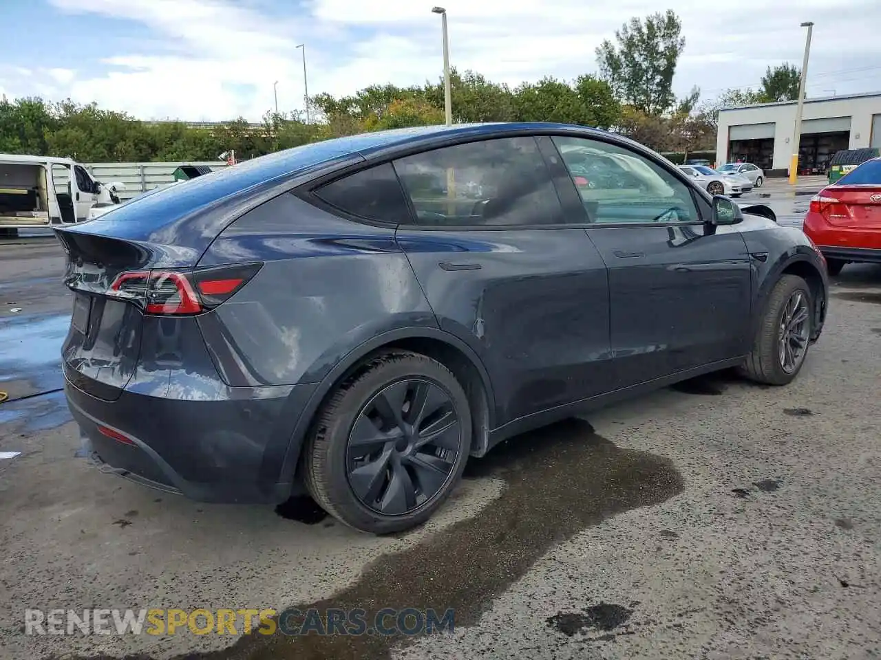 3 Photograph of a damaged car 7SAYGDED0RA329636 TESLA MODEL Y 2024
