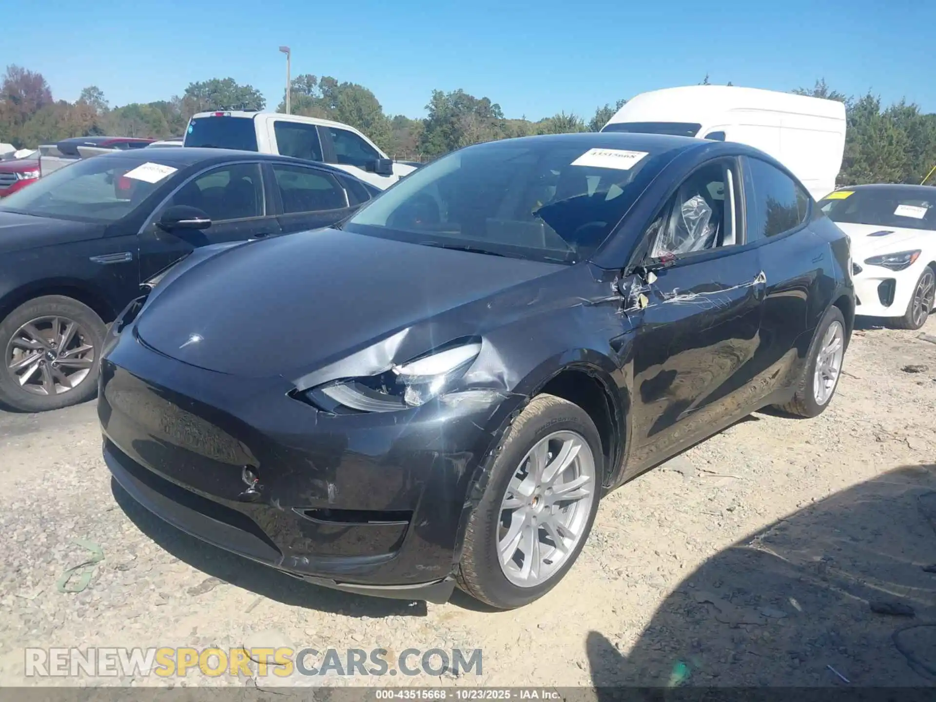 2 Photograph of a damaged car 7SAYGDED0RF005489 TESLA MODEL Y 2024