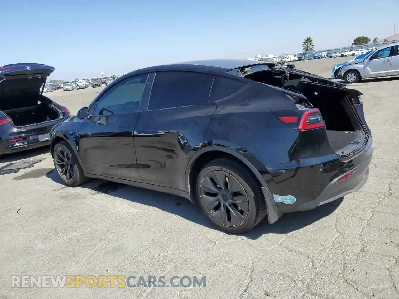2 Photograph of a damaged car 7SAYGDED0RF095274 TESLA MODEL Y 2024