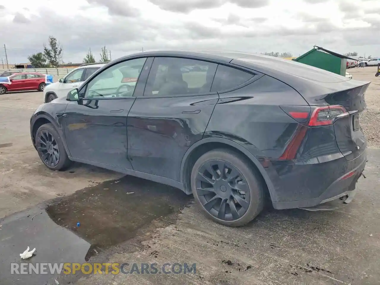 2 Photograph of a damaged car 7SAYGDED0RF103065 TESLA MODEL Y 2024