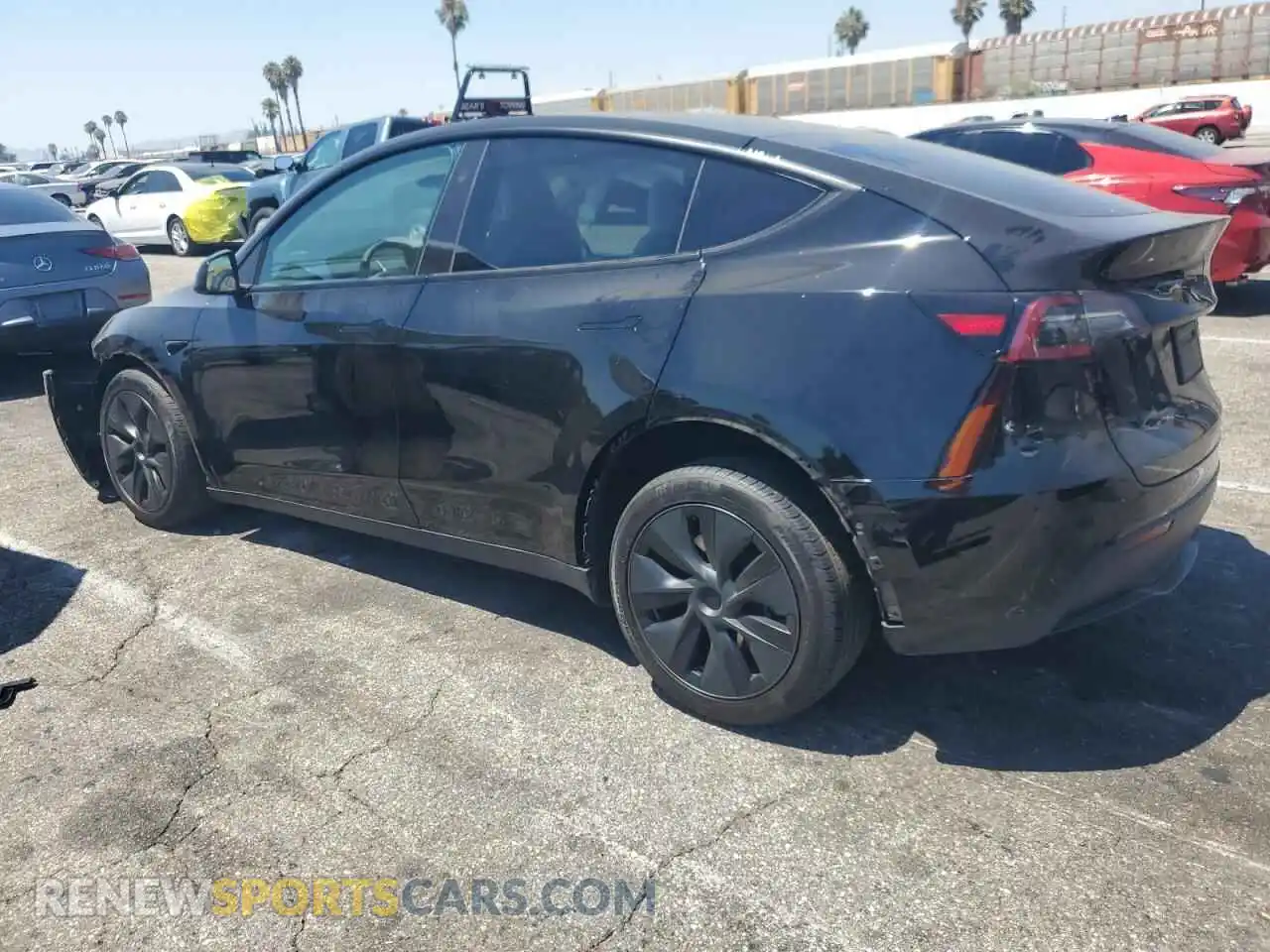 2 Photograph of a damaged car 7SAYGDED0RF124191 TESLA MODEL Y 2024
