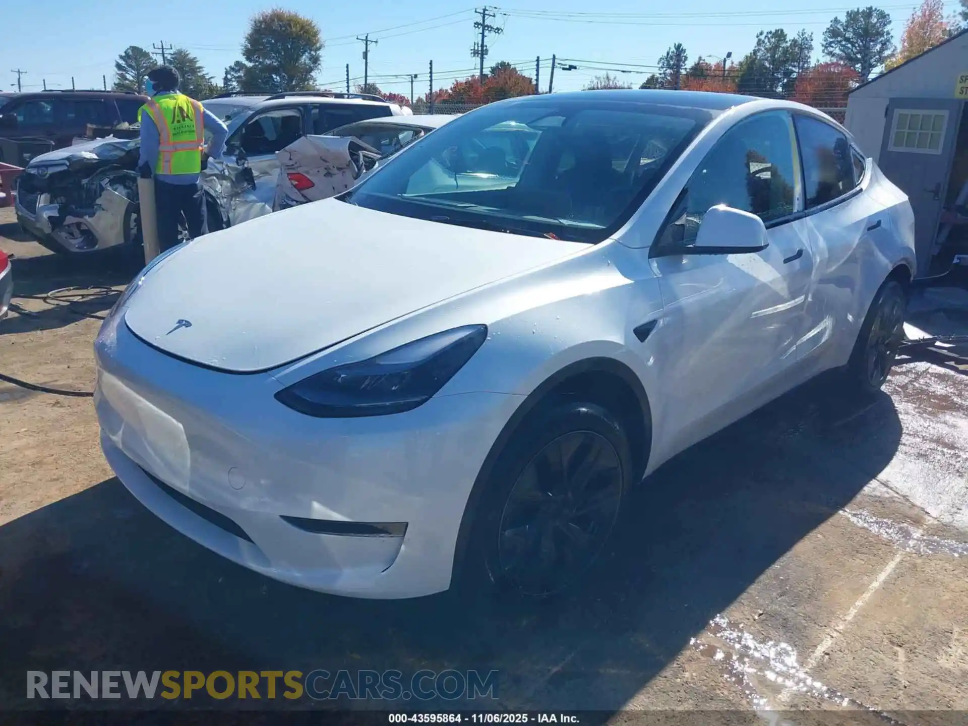 2 Photograph of a damaged car 7SAYGDED1RA321710 TESLA MODEL Y 2024