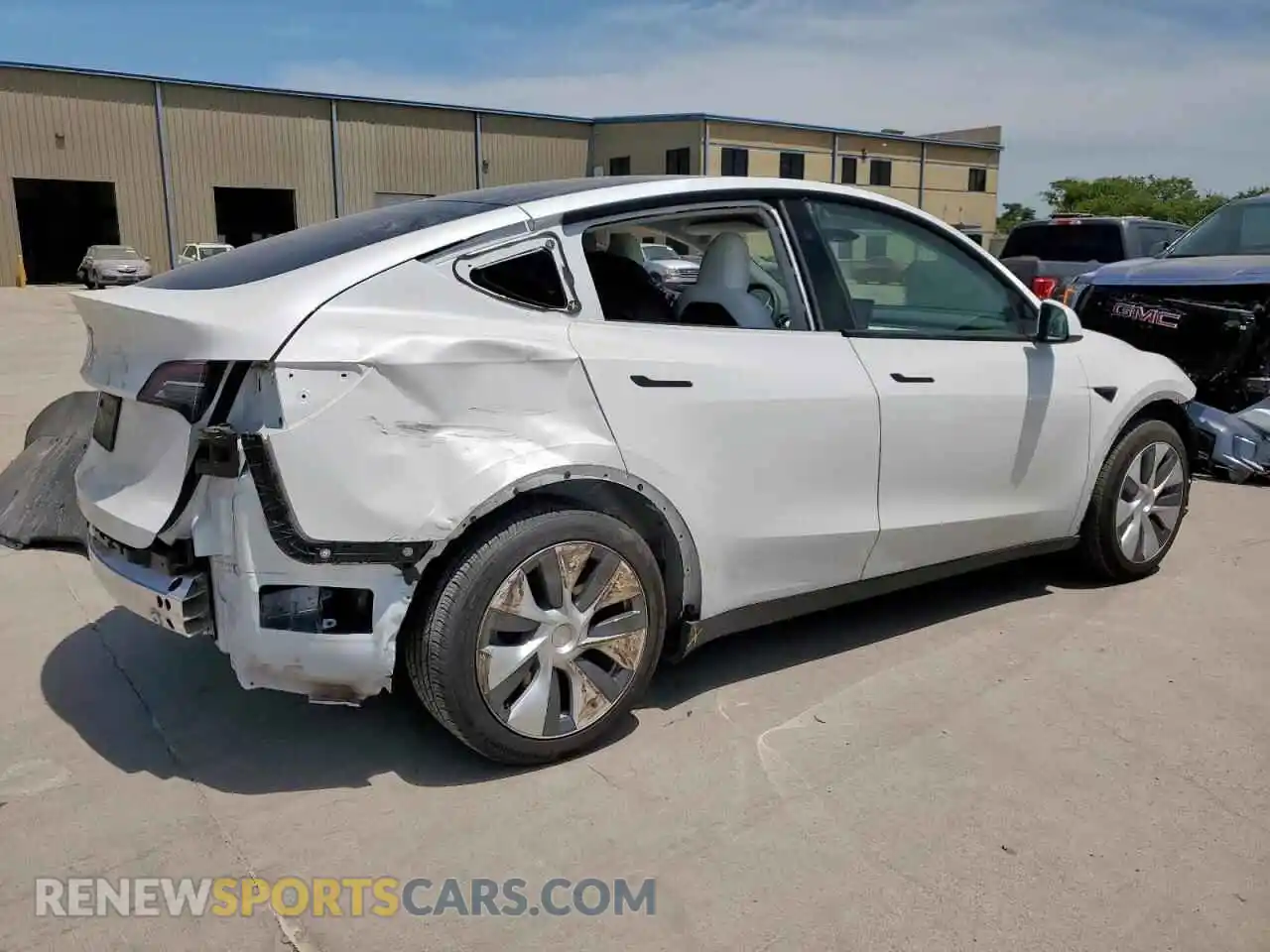 3 Photograph of a damaged car 7SAYGDED1RF085594 TESLA MODEL Y 2024
