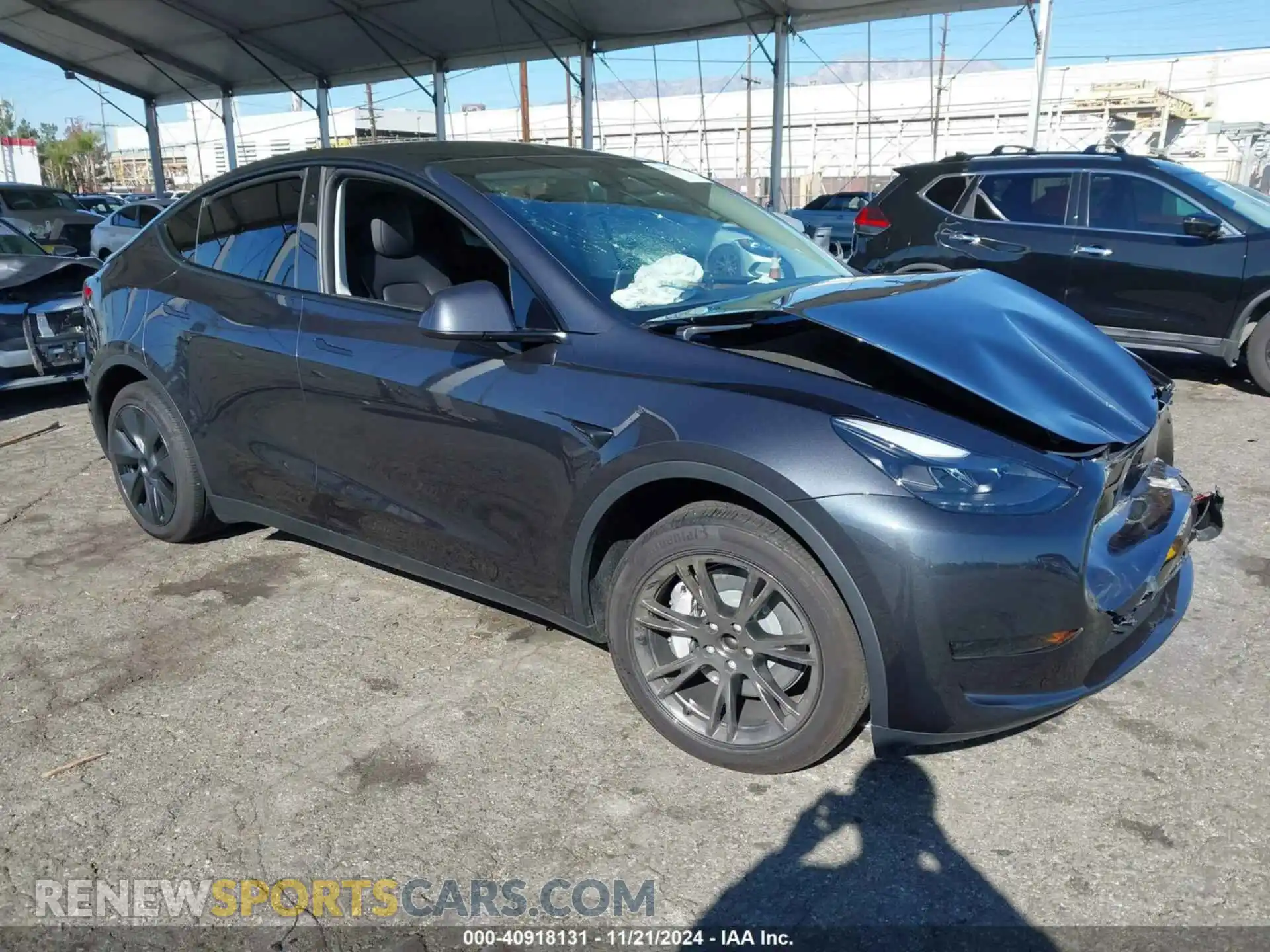 1 Photograph of a damaged car 7SAYGDED2RF103407 TESLA MODEL Y 2024