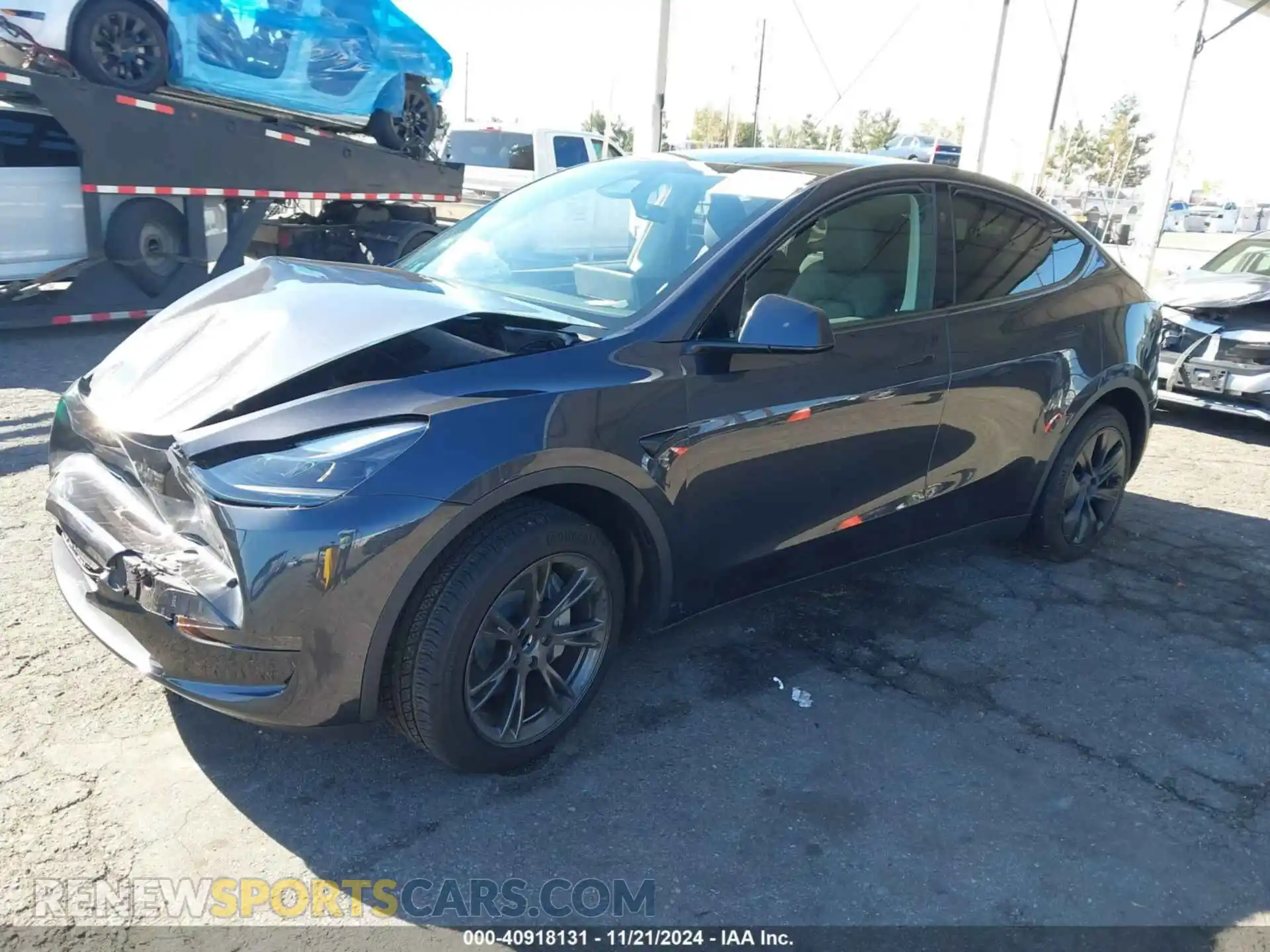 2 Photograph of a damaged car 7SAYGDED2RF103407 TESLA MODEL Y 2024