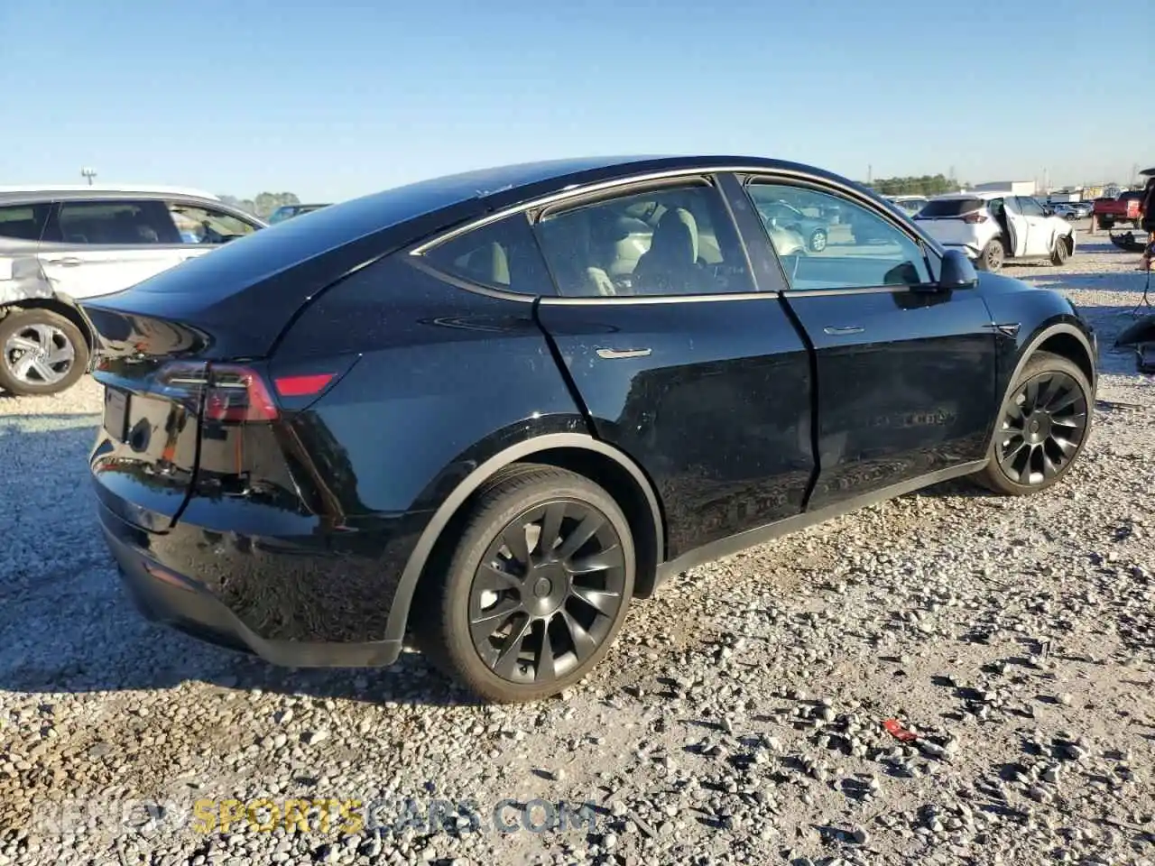 3 Photograph of a damaged car 7SAYGDED2RF162151 TESLA MODEL Y 2024