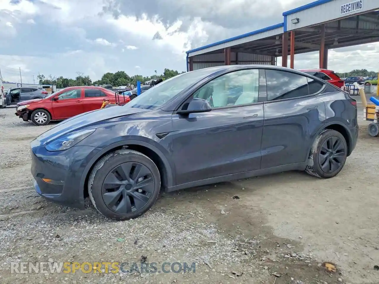 1 Photograph of a damaged car 7SAYGDED2RF185140 TESLA MODEL Y 2024