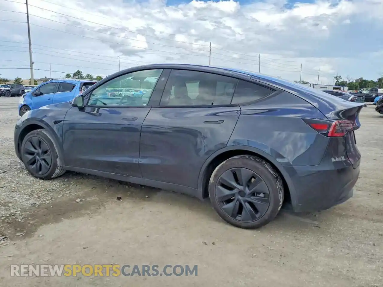 2 Photograph of a damaged car 7SAYGDED2RF185140 TESLA MODEL Y 2024