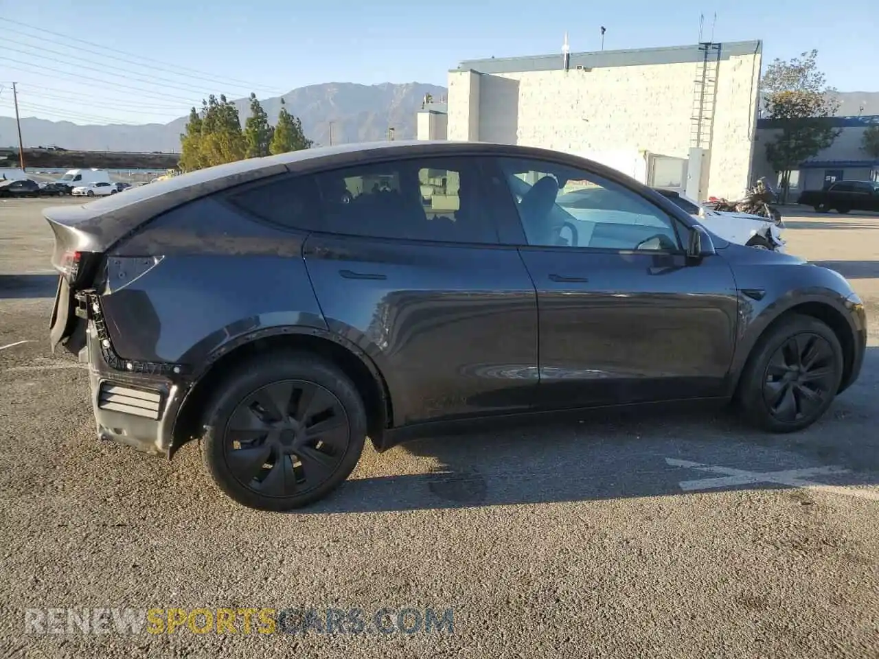 3 Photograph of a damaged car 7SAYGDED2RF200414 TESLA MODEL Y 2024