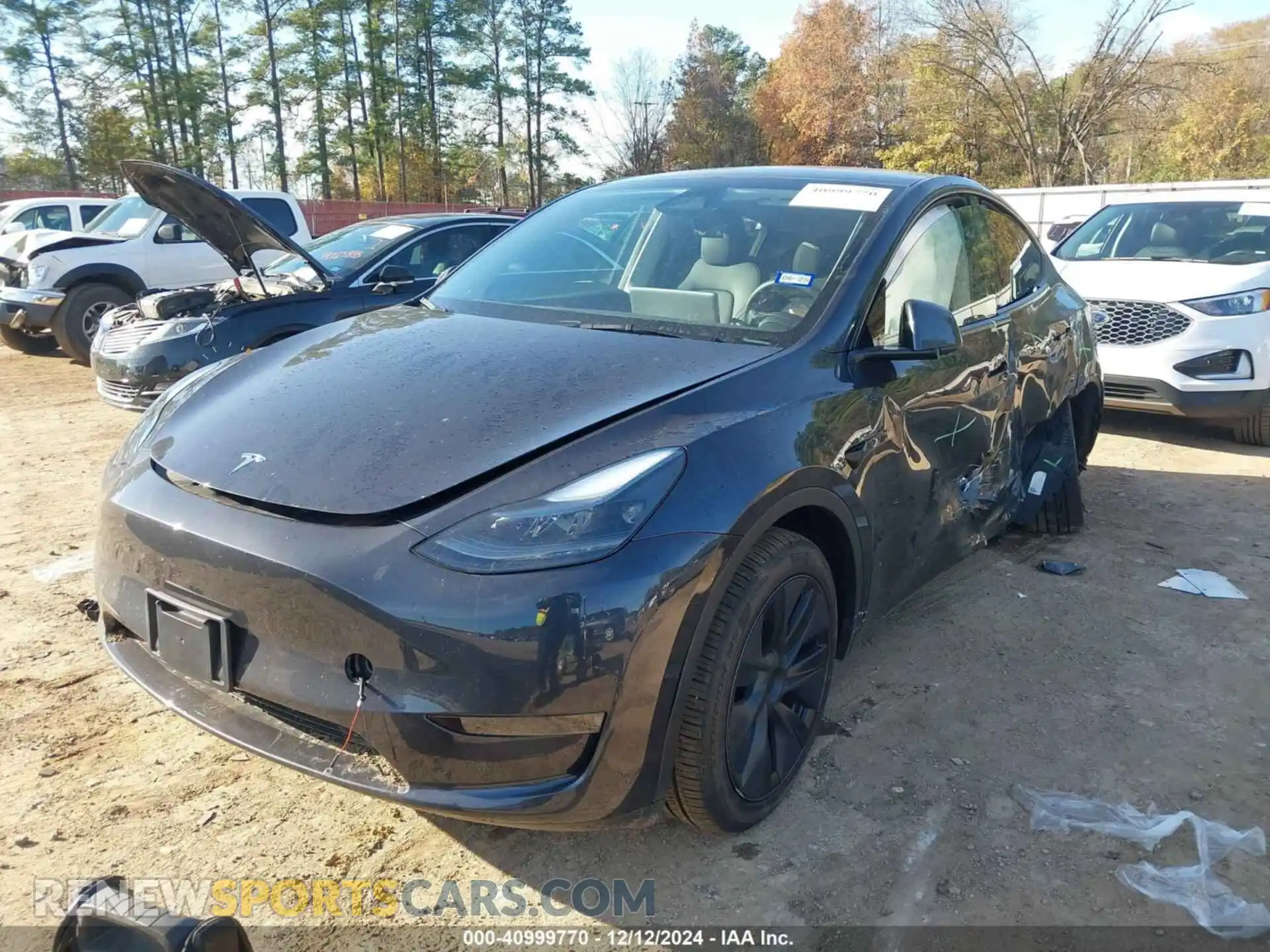 2 fotografías del automóvil dañado 7SAYGDED3RA304827 TESLA MODEL Y 2024