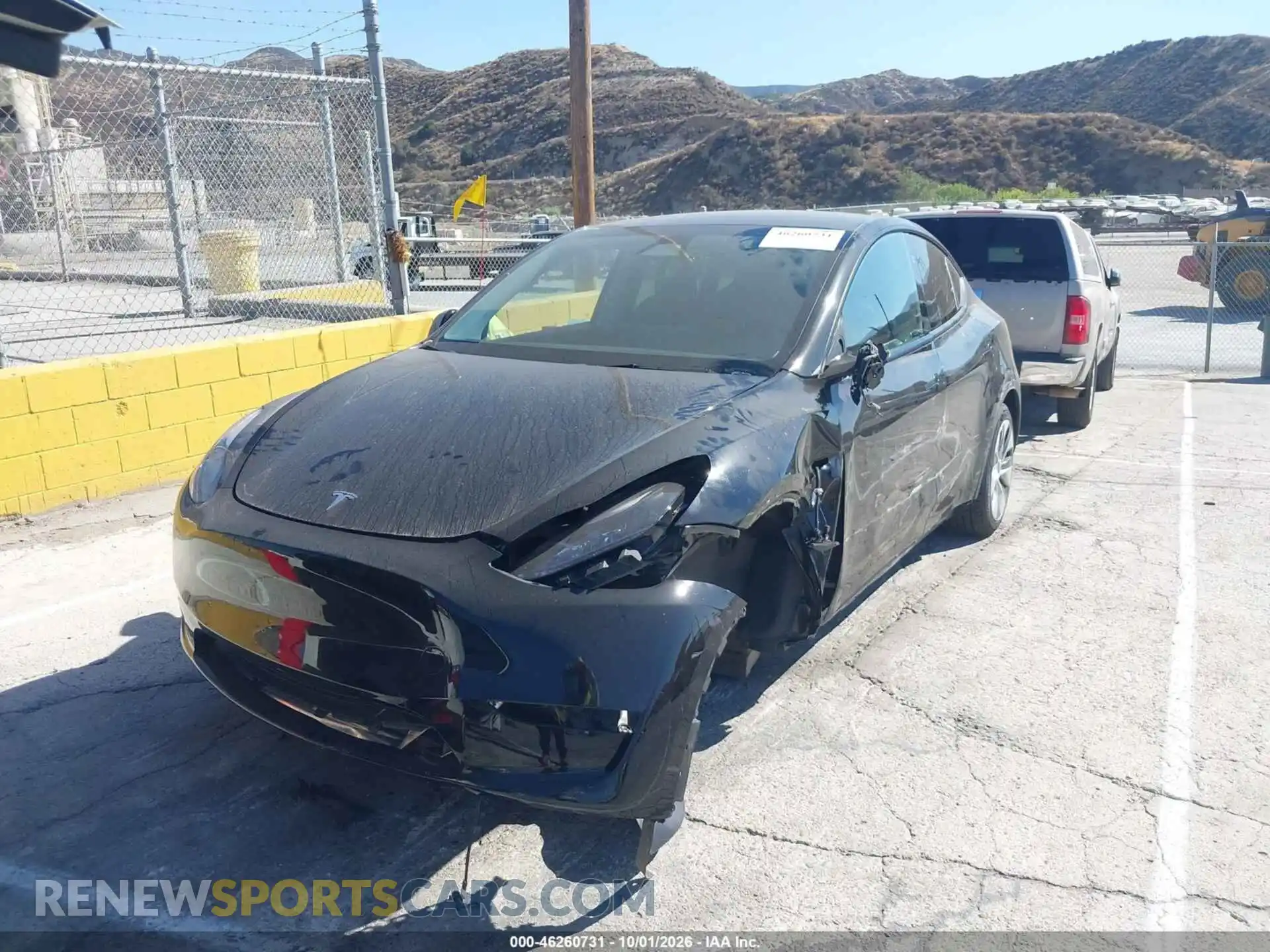 2 fotografías del automóvil dañado 7SAYGDED3RF009441 TESLA MODEL Y 2024