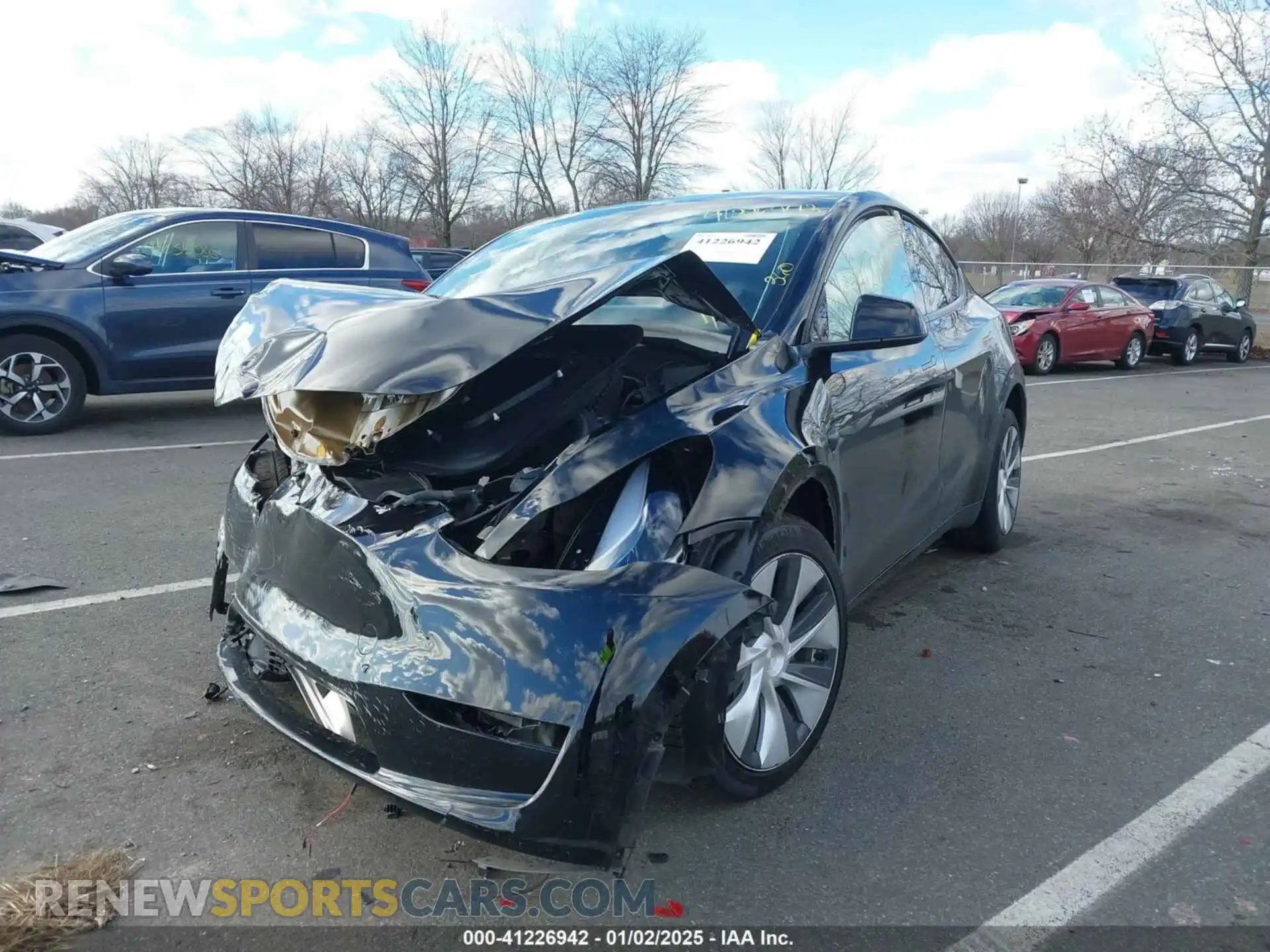 2 Photograph of a damaged car 7SAYGDED3RF019113 TESLA MODEL Y 2024