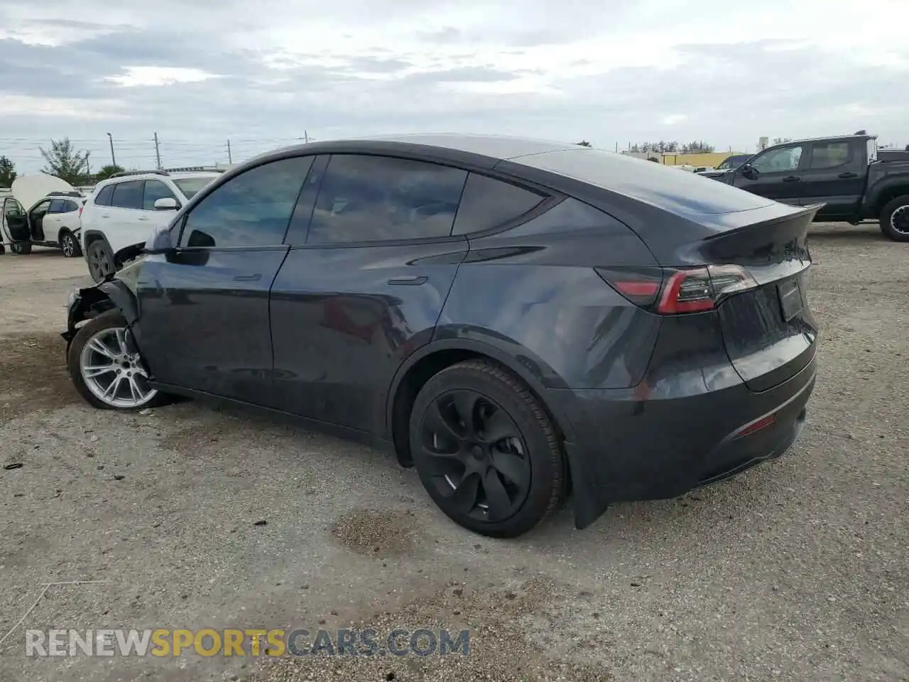 2 Photograph of a damaged car 7SAYGDED3RF056534 TESLA MODEL Y 2024