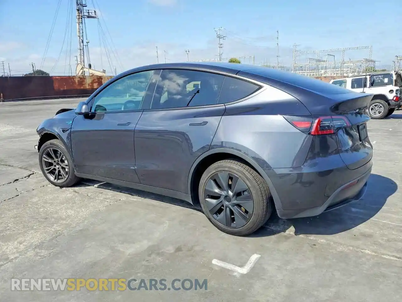 2 Photograph of a damaged car 7SAYGDED3RF102444 TESLA MODEL Y 2024