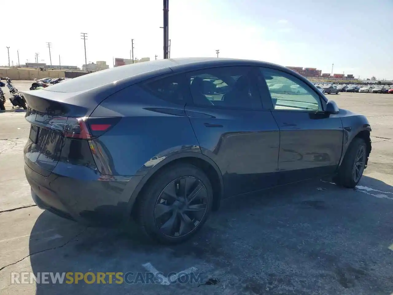 3 Photograph of a damaged car 7SAYGDED3RF102444 TESLA MODEL Y 2024