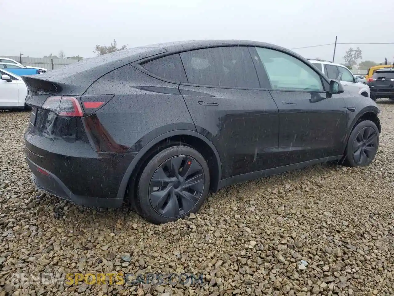 3 Photograph of a damaged car 7SAYGDED3RF108700 TESLA MODEL Y 2024