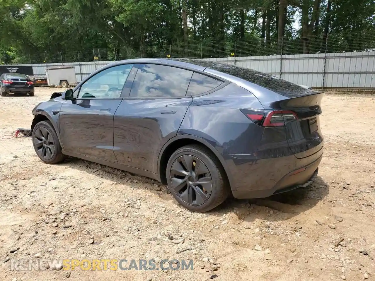 2 Photograph of a damaged car 7SAYGDED3RF109250 TESLA MODEL Y 2024