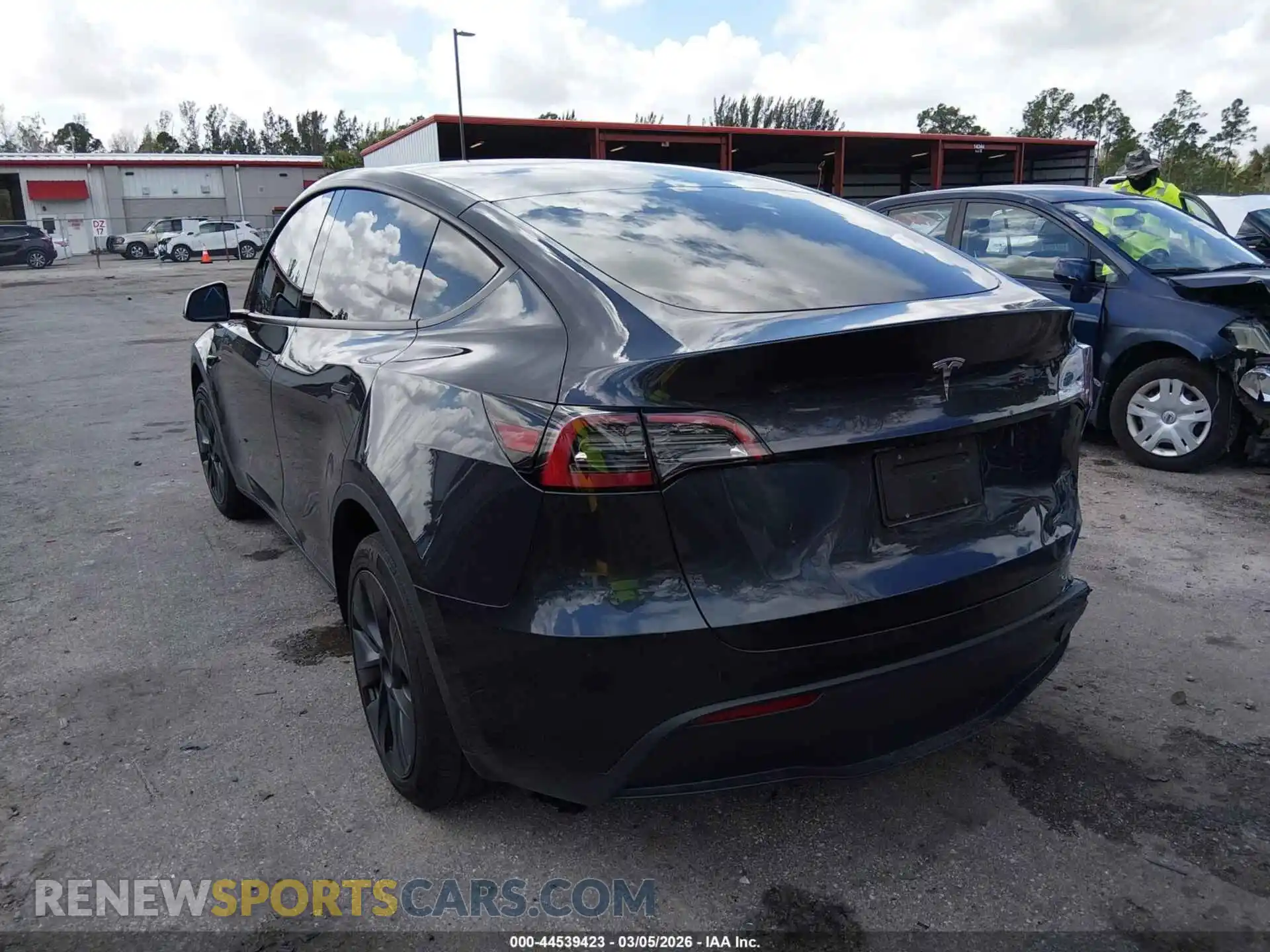 3 Photograph of a damaged car 7SAYGDED3RF109930 TESLA MODEL Y 2024
