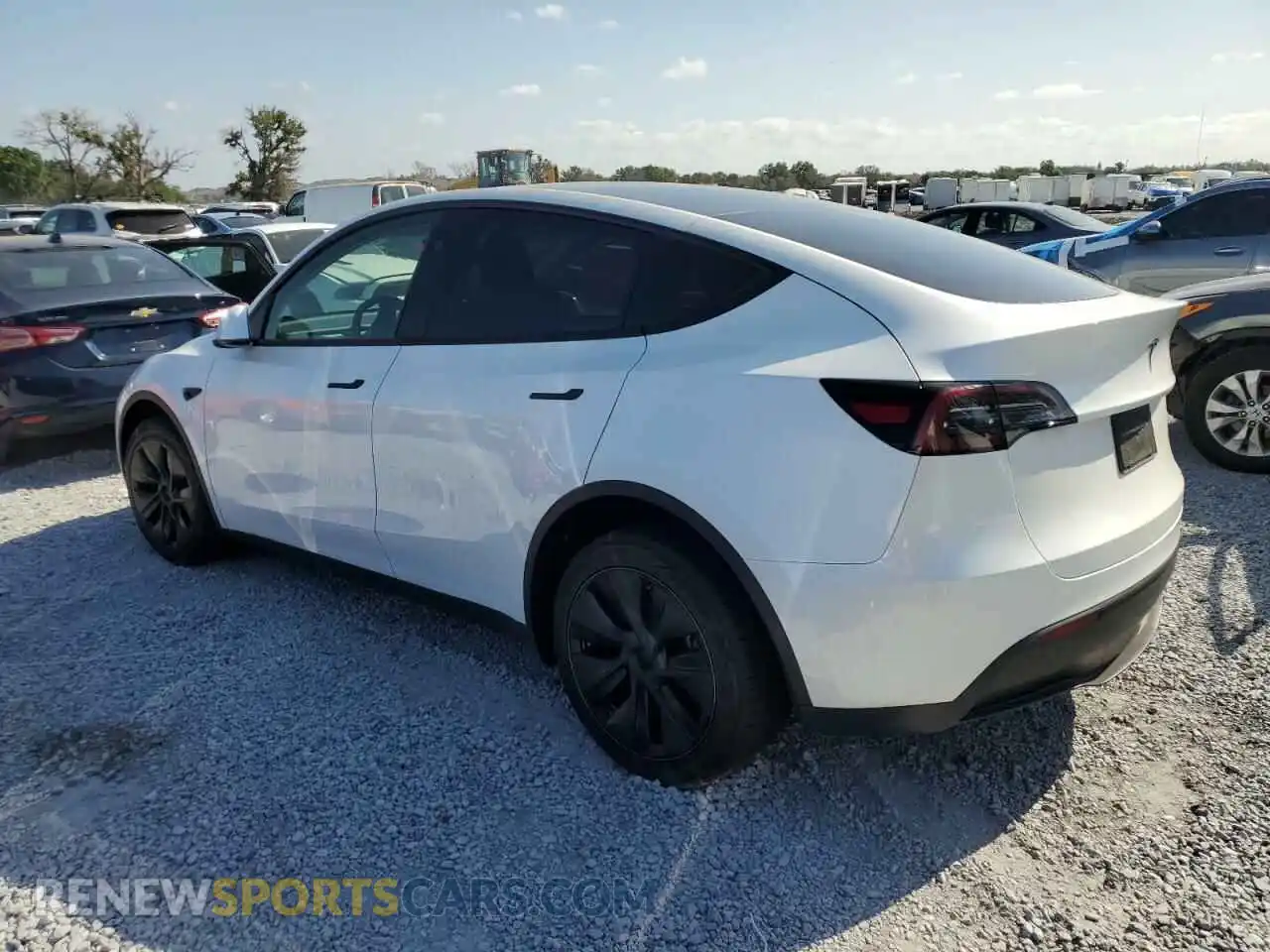 2 fotografías del automóvil dañado 7SAYGDED3RF131376 TESLA MODEL Y 2024