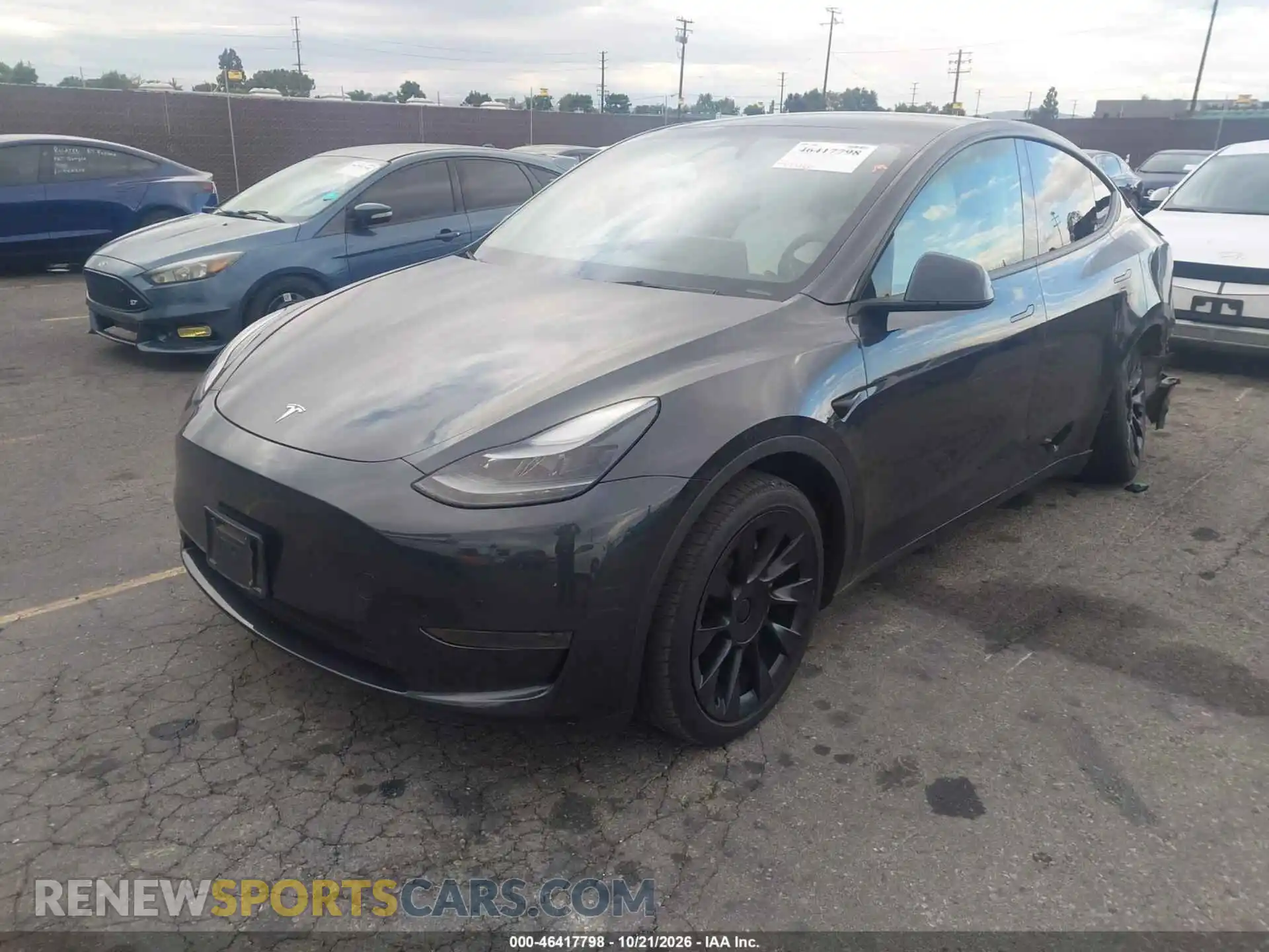 2 Photograph of a damaged car 7SAYGDED3RF152888 TESLA MODEL Y 2024