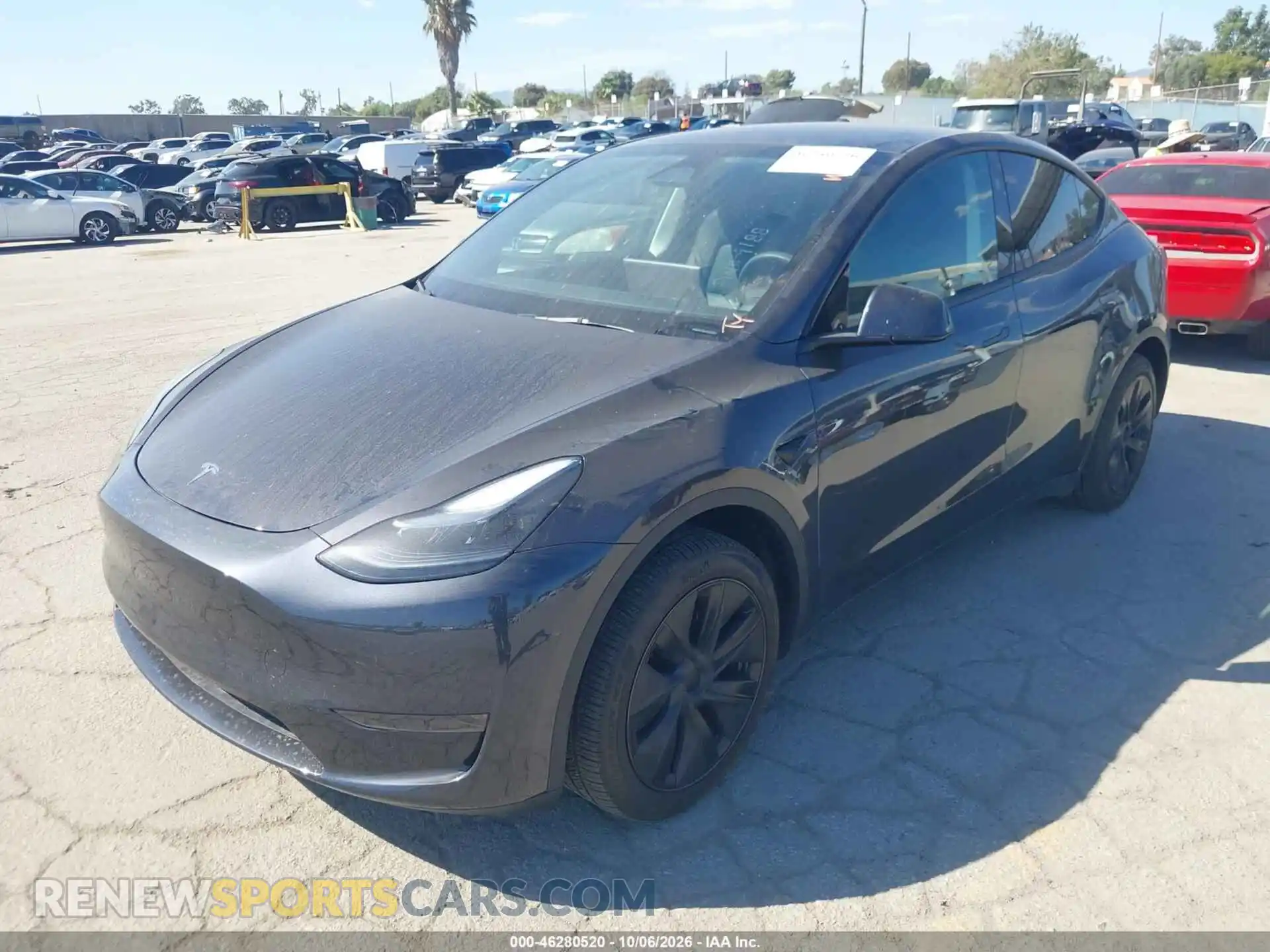 2 Photograph of a damaged car 7SAYGDED3RF156178 TESLA MODEL Y 2024