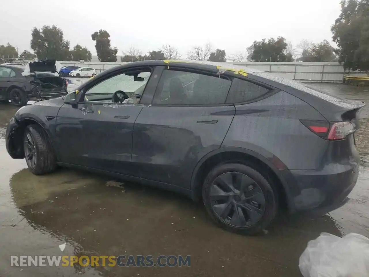 2 Photograph of a damaged car 7SAYGDED3RF162885 TESLA MODEL Y 2024