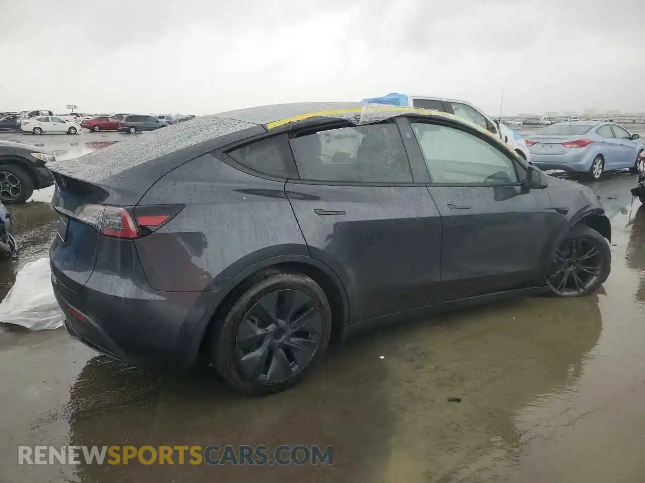 3 Photograph of a damaged car 7SAYGDED3RF162885 TESLA MODEL Y 2024