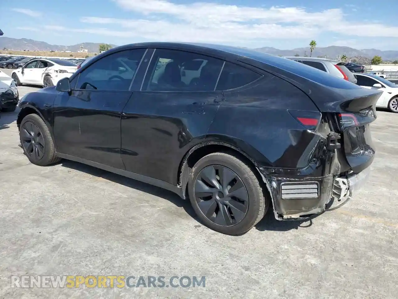 2 Photograph of a damaged car 7SAYGDED3RF182893 TESLA MODEL Y 2024
