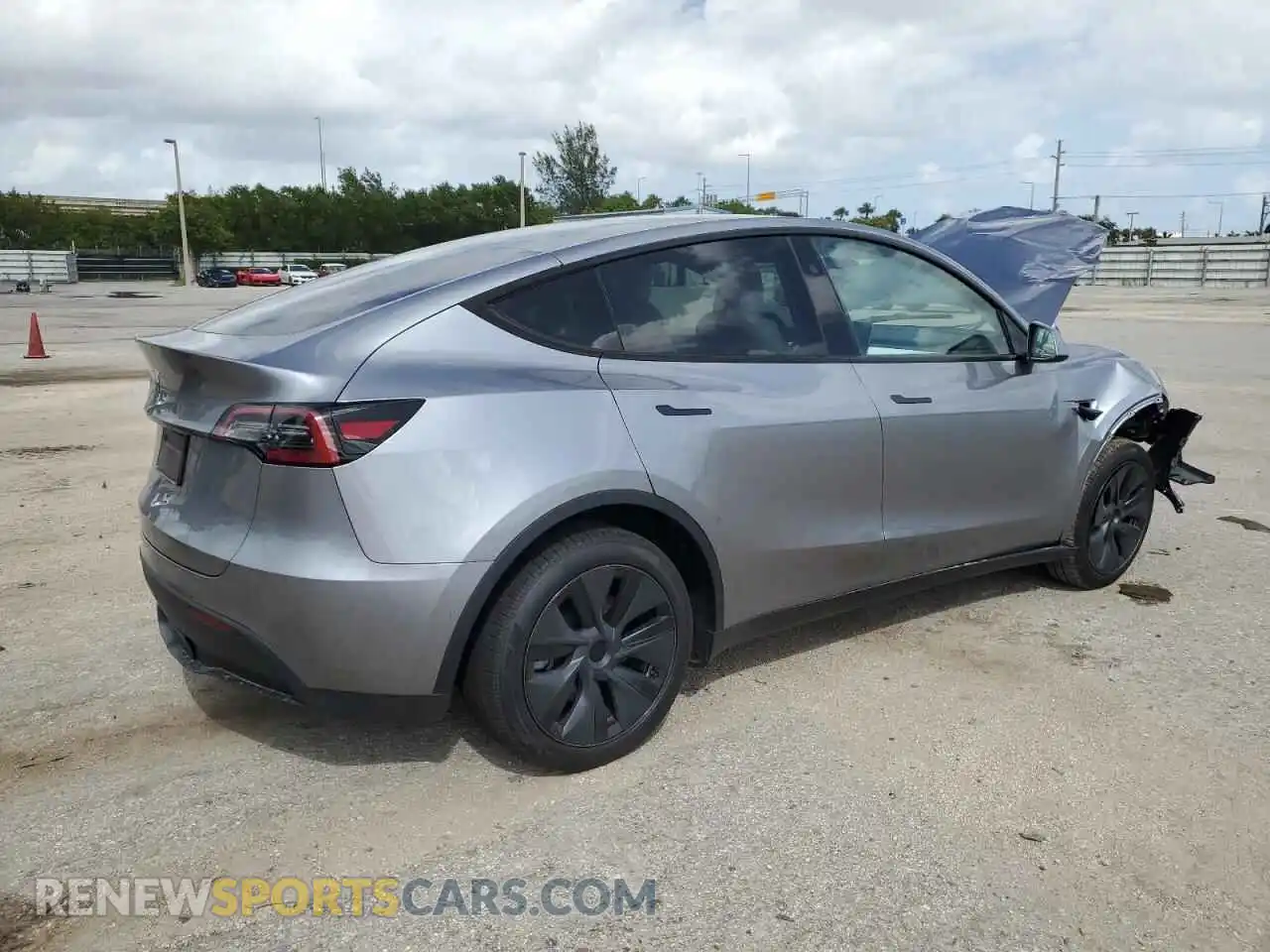 3 Photograph of a damaged car 7SAYGDED4RA321930 TESLA MODEL Y 2024