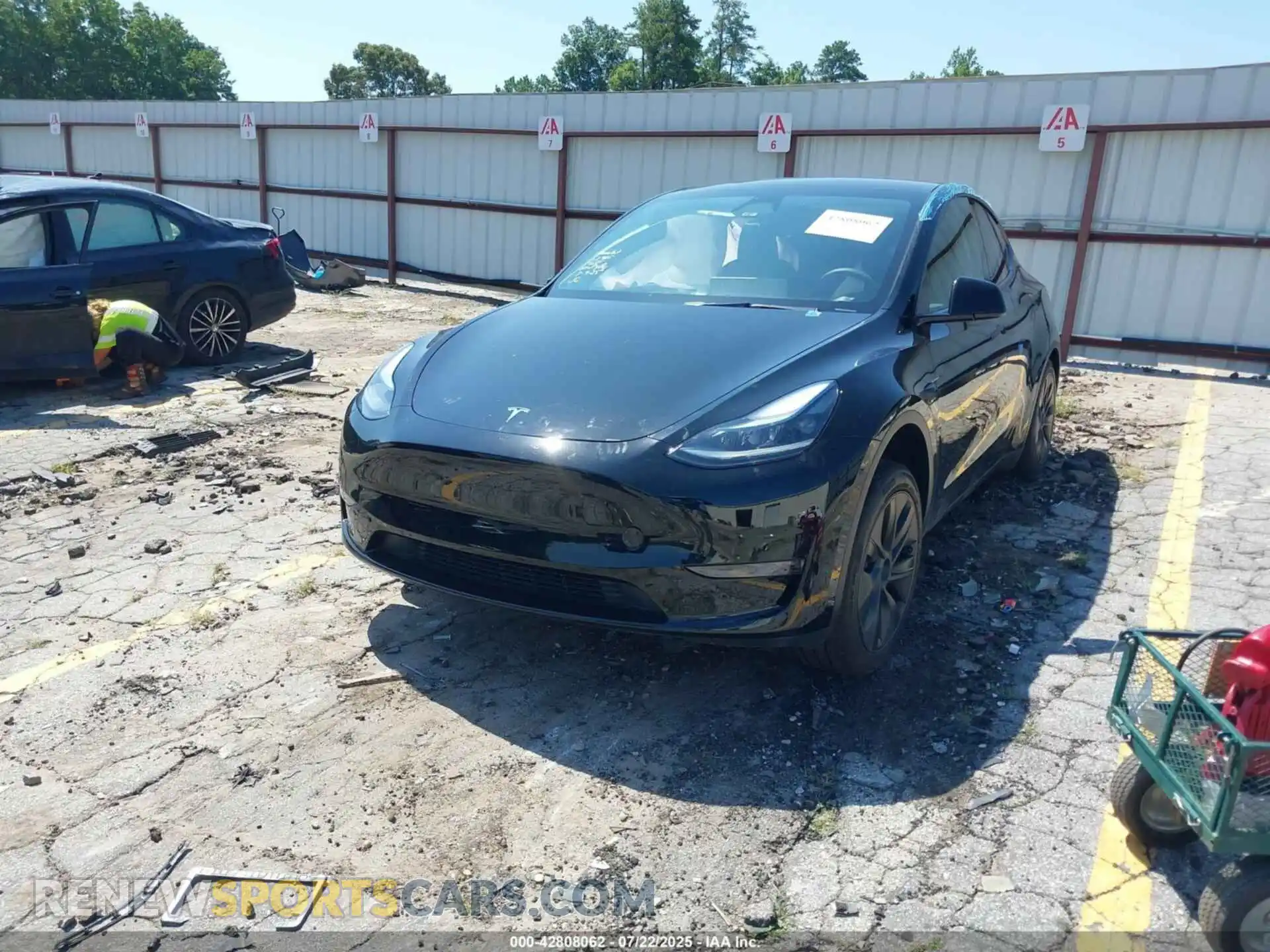 2 Photograph of a damaged car 7SAYGDED4RA332118 TESLA MODEL Y 2024