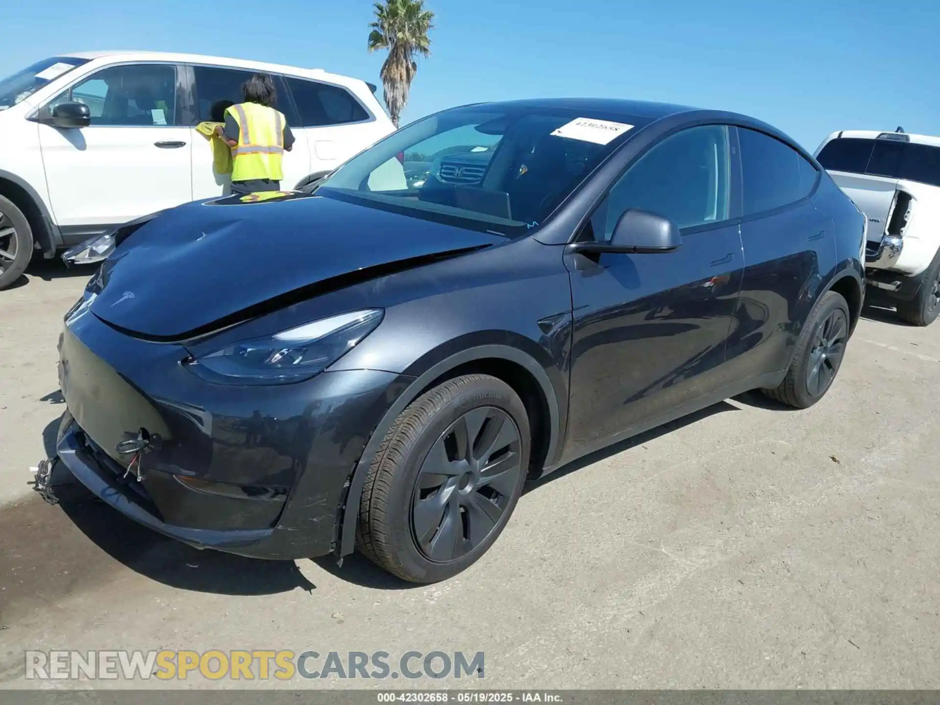 2 Photograph of a damaged car 7SAYGDED4RF115252 TESLA MODEL Y 2024
