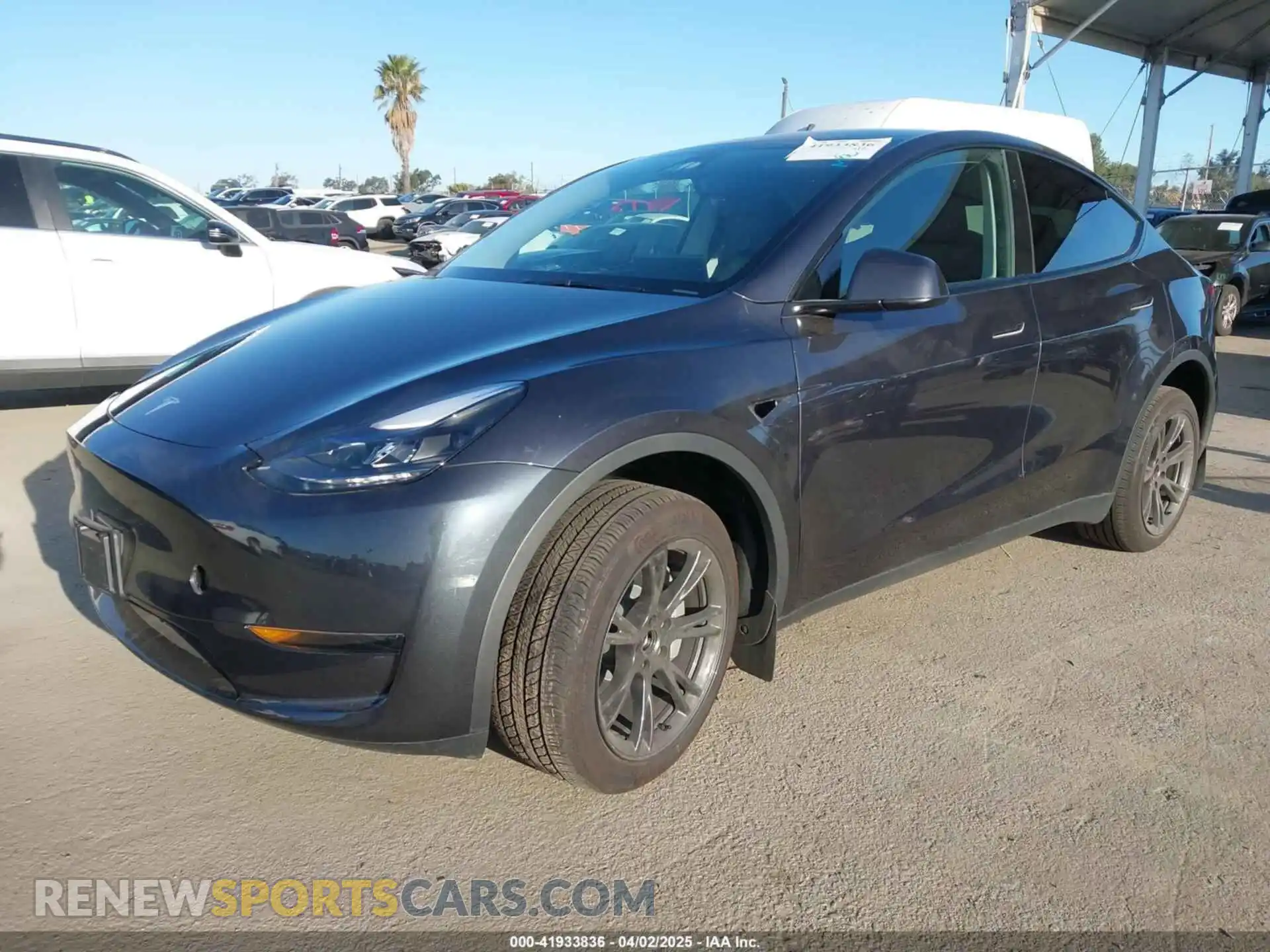 2 Photograph of a damaged car 7SAYGDED5RF103983 TESLA MODEL Y 2024