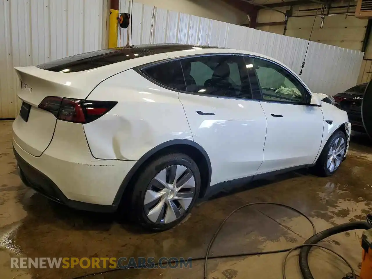 3 Photograph of a damaged car 7SAYGDED5RF127426 TESLA MODEL Y 2024