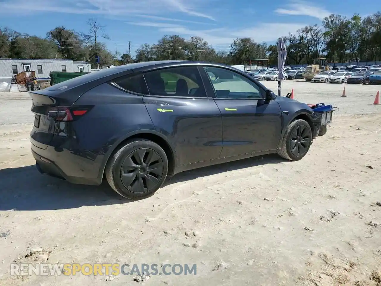 3 Photograph of a damaged car 7SAYGDED5RF210256 TESLA MODEL Y 2024