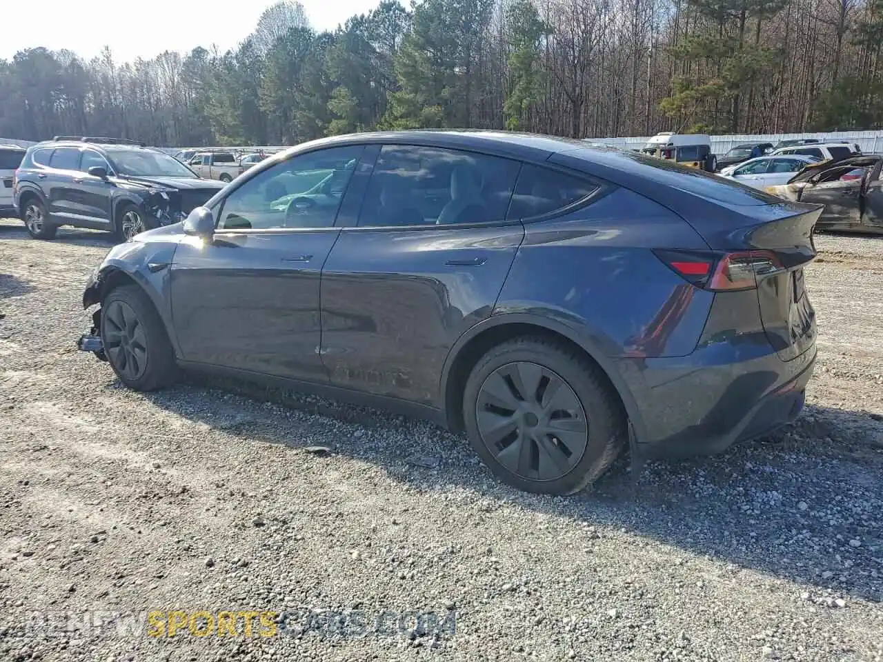 2 Photograph of a damaged car 7SAYGDED6RF104477 TESLA MODEL Y 2024