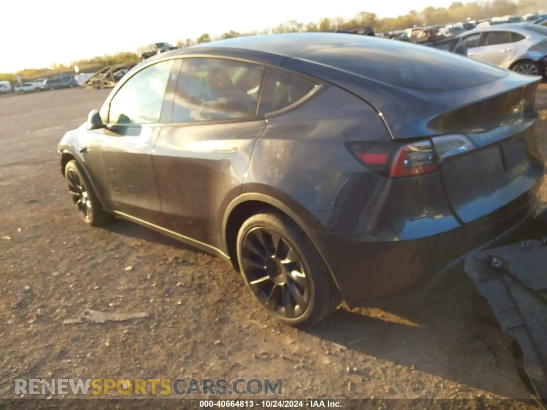 3 Photograph of a damaged car 7SAYGDED6RF105175 TESLA MODEL Y 2024
