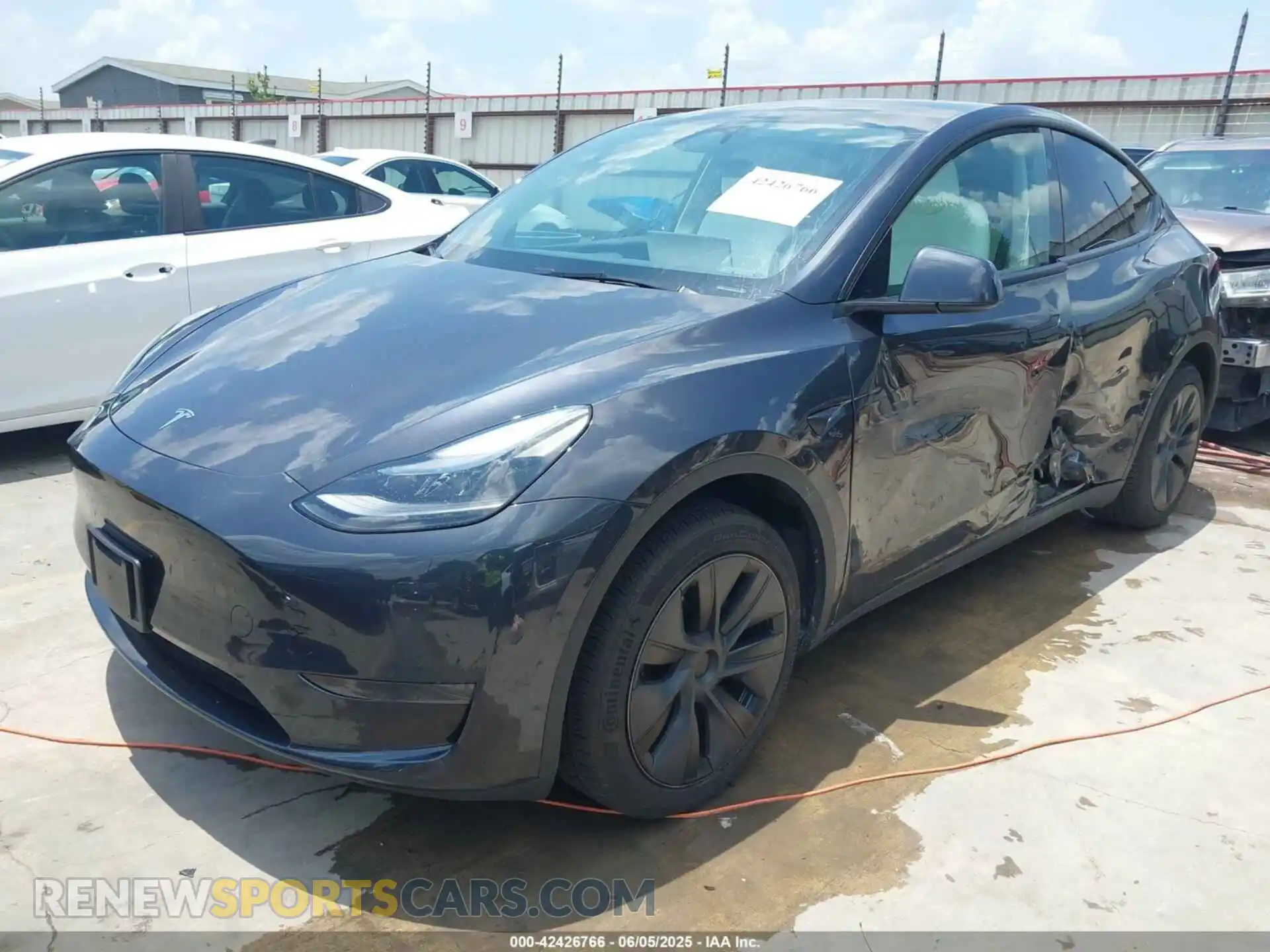 2 Photograph of a damaged car 7SAYGDED6RF105712 TESLA MODEL Y 2024