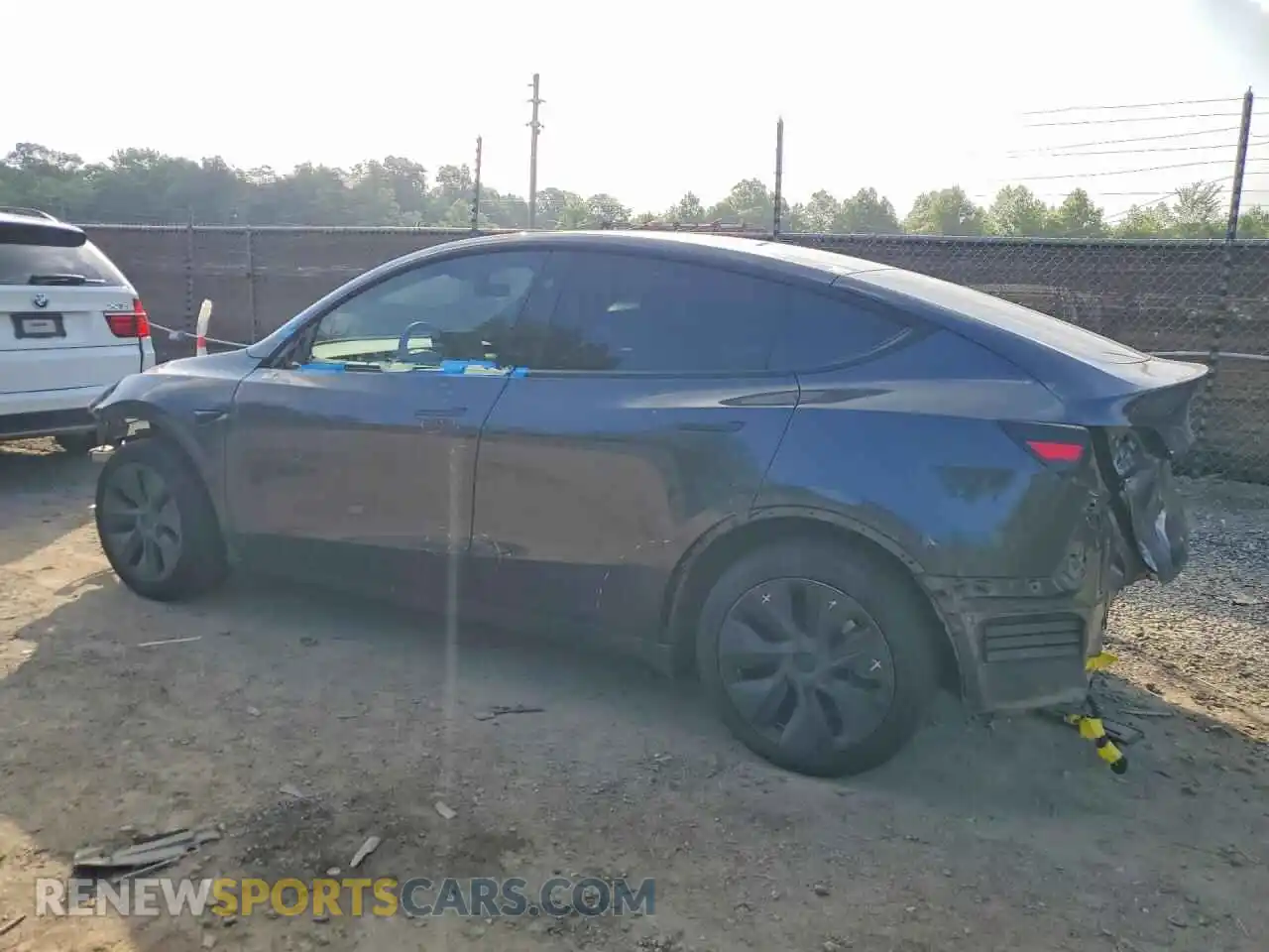 2 Photograph of a damaged car 7SAYGDED6RF110814 TESLA MODEL Y 2024