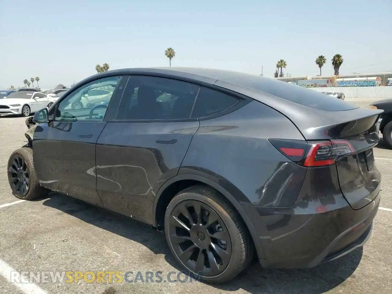 2 Photograph of a damaged car 7SAYGDED7RF054334 TESLA MODEL Y 2024