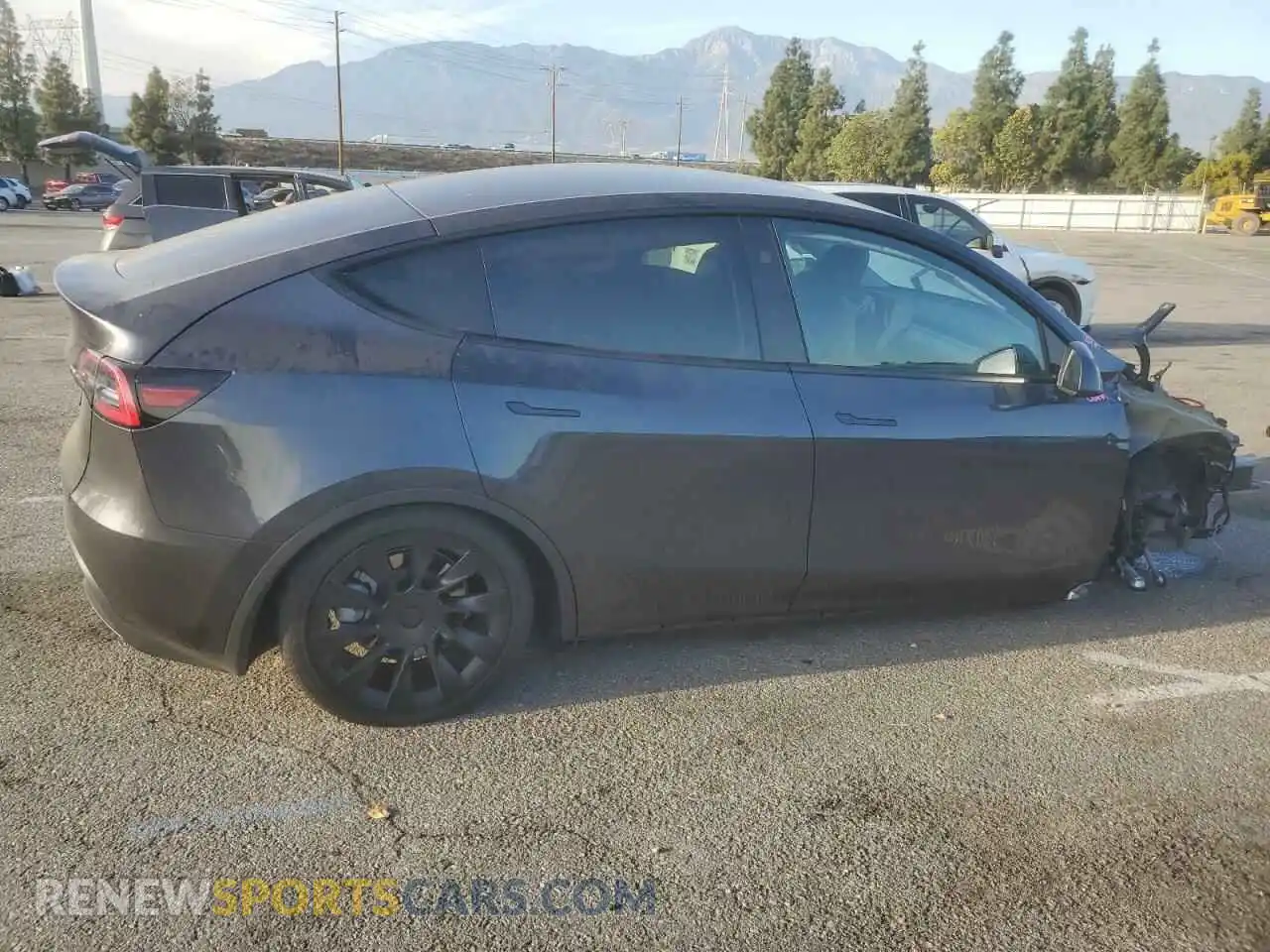 3 Photograph of a damaged car 7SAYGDED7RF056973 TESLA MODEL Y 2024