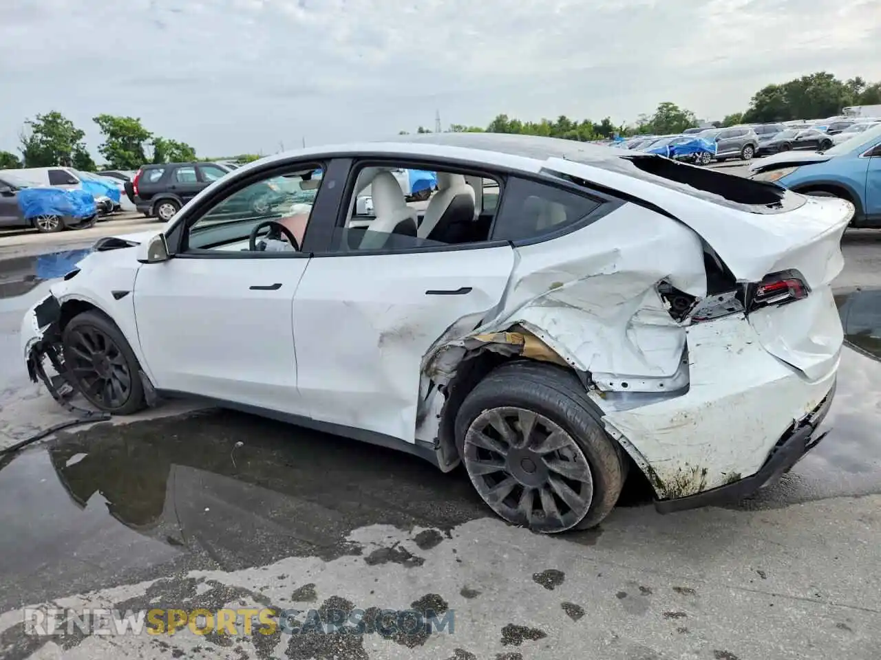 2 fotografías del automóvil dañado 7SAYGDED7RF102592 TESLA MODEL Y 2024