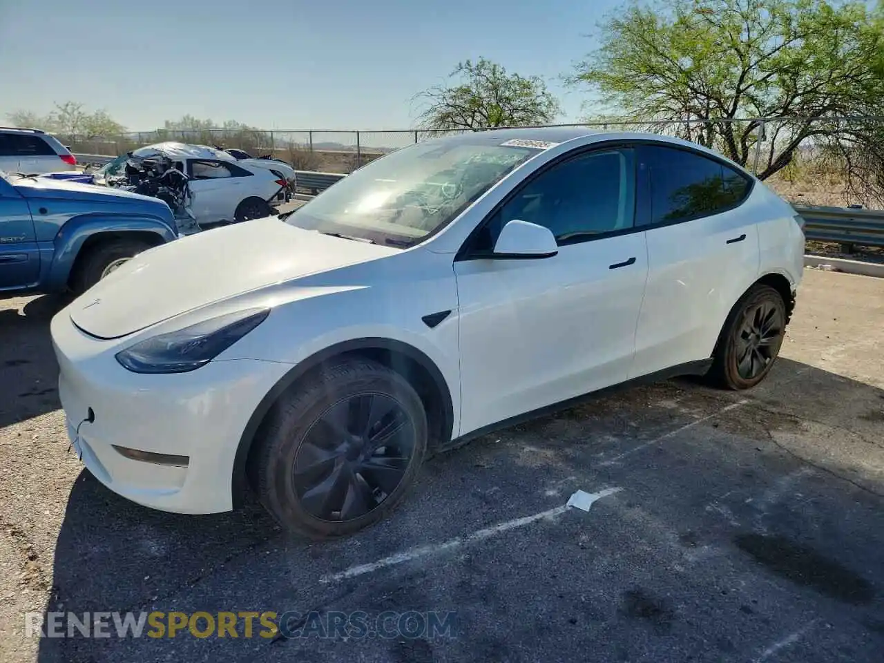 1 Photograph of a damaged car 7SAYGDED7RF130909 TESLA MODEL Y 2024