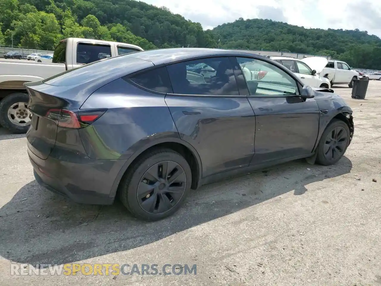 3 Photograph of a damaged car 7SAYGDED8RF193677 TESLA MODEL Y 2024