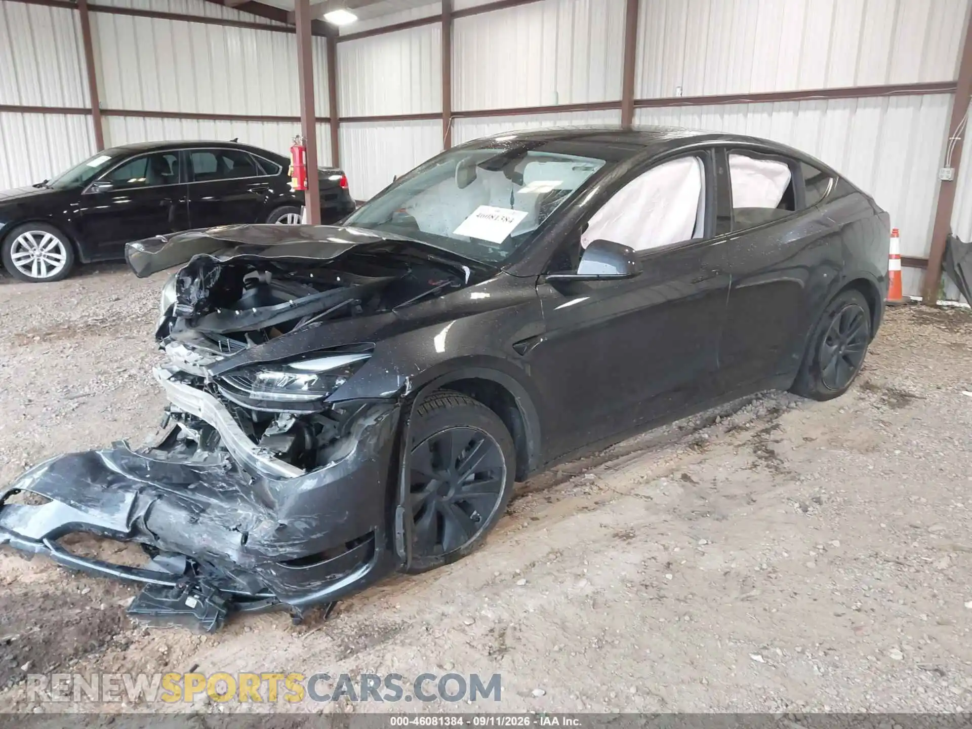 2 Photograph of a damaged car 7SAYGDED9RA322300 TESLA MODEL Y 2024